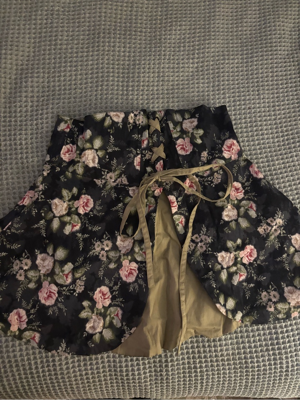 The Pyramid Collection Black Floral Crop Top with Olive Tie
